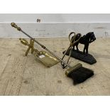 A 19th century cast iron door stop in the form of a horse, together with a pair of brass fire tongs,
