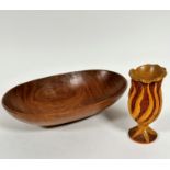 A teak mid century oval salad bowl, (h 9cm x 39cm x 24cm) and a Donnachi treen carved elm vase