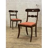 A pair of Regency design mahogany side chairs, early 20th century, with scroll carved crest rail
