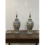A pair of Chinese style crackle glazed blue and white ceramic table lamps, H44cm (excluding bulb)