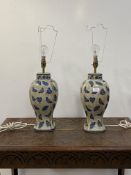 A pair of Chinese style crackle glazed blue and white ceramic table lamps, H44cm (excluding bulb)