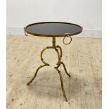 A mid century modern faux bamboo gilt aluminium lamp table, the circular black glass top raised on