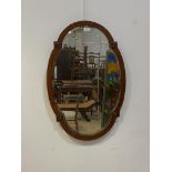 An Edwardian mahogany framed wall hanging mirror with bevelled plate 54cm x 78cm