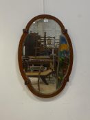 An Edwardian mahogany framed wall hanging mirror with bevelled plate 54cm x 78cm