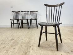 A set of four vintage stained ash plywood and turned beech dining chairs, with comb back and