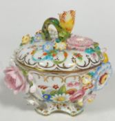 A Coalport Coalbrookdale posy dish and cover decorated in the Coalbrookdale style with floral