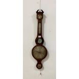 An early Victorian barometer and thermomter in an inlaid mahogany banjo pattern case, with