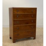 An Edwardian mahogany chest, fitted with five graduated drawers, raised on bracket supports, H101cm,