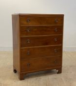 An Edwardian mahogany chest, fitted with five graduated drawers, raised on bracket supports, H101cm,