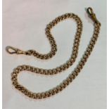 A 9ct gold curblink Albert watch chain, with lobster clasps. Length overall 41cm, 33 grams.