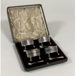 A cased set of four George V silver salts, Holland, Aldwinckle & Slater, London 1912, in 18th