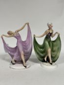 Katzhutte, a pair of porcelain Art Deco figures of ladies, each holding the hem of her dress