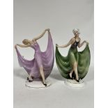 Katzhutte, a pair of porcelain Art Deco figures of ladies, each holding the hem of her dress