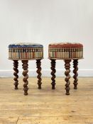 A pair of Victorian mahogany stools, the seats of cylindrical outline covered in the original