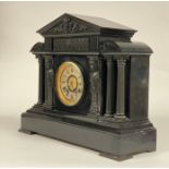 An impressive Victorian bronze mounted black marble mantle clock of architectural form, the case