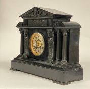 An impressive Victorian bronze mounted black marble mantle clock of architectural form, the case