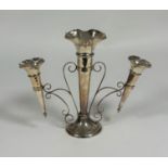 A George V silver epergne, Walker & Hall, Sheffield, 1919, the three trumpet vases with fluted