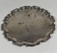 A George V silver tea tray, Alexander Clark & Co., Birmingham 1931, in the Georgian taste, circular,