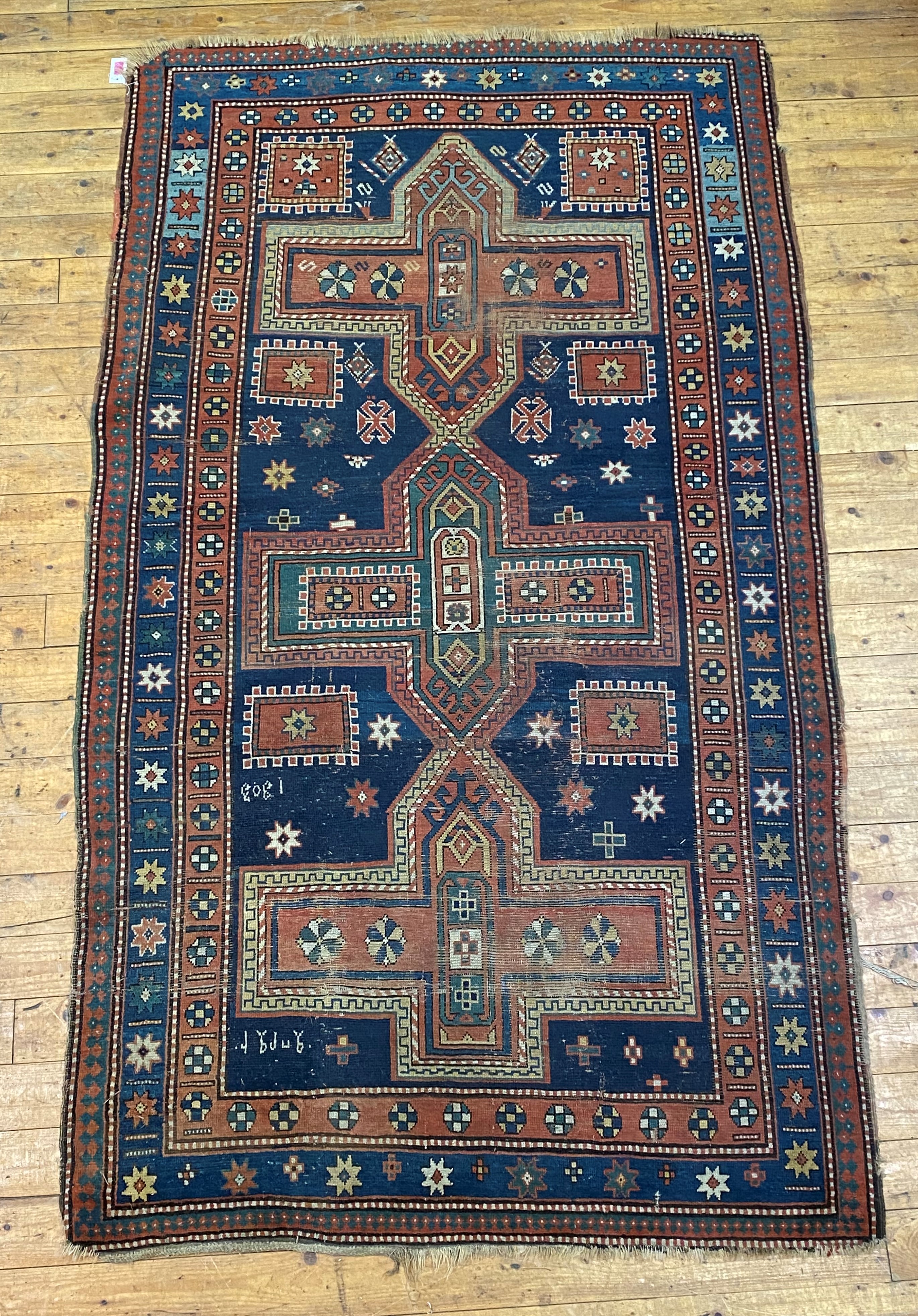 A hand knotted Caucasian Kazak rug, early 20th century, the blue field decorated with three - Image 2 of 3