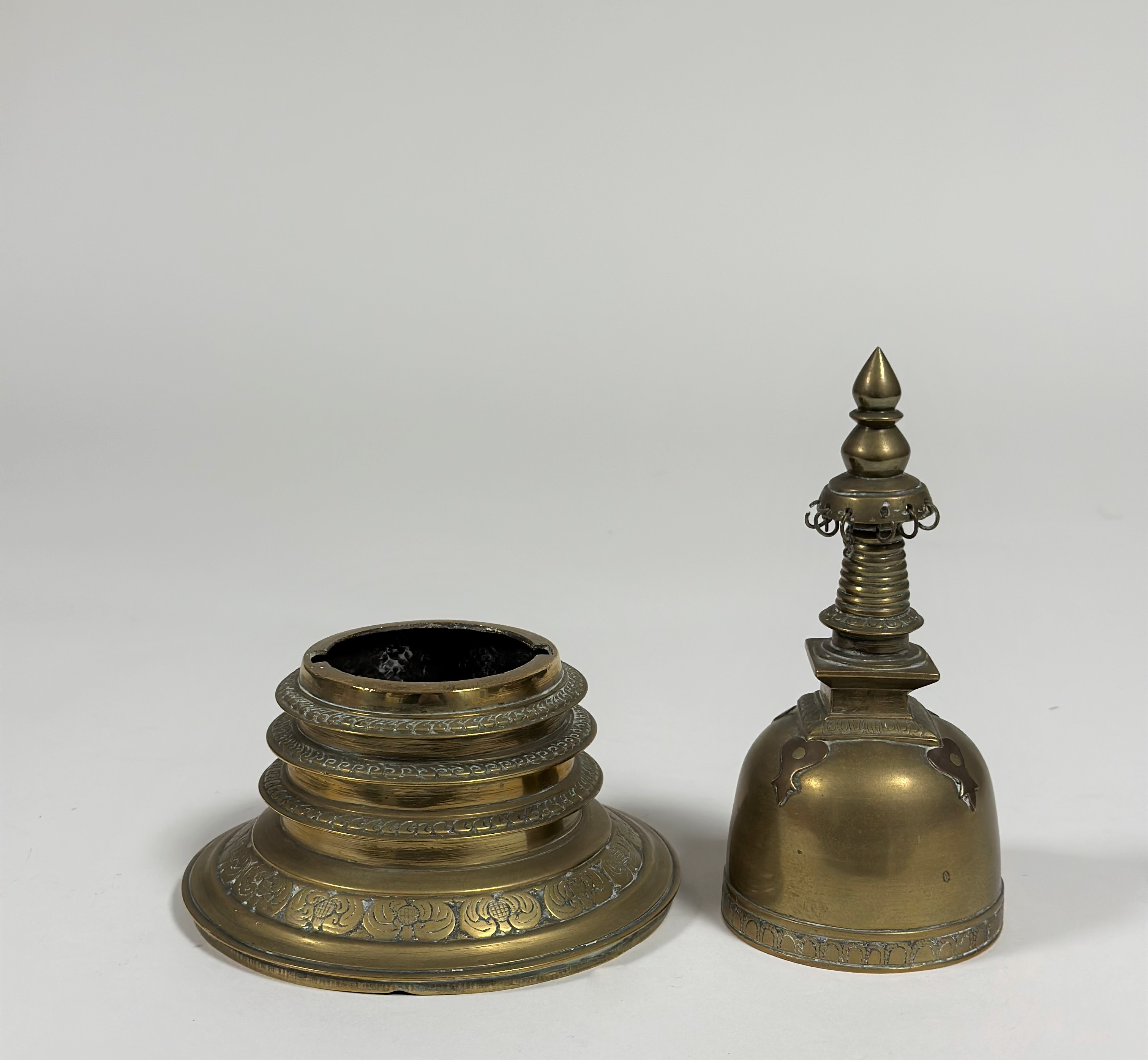 Two brass stupa, probably Indian, of characteristic design. 25cm and 21cm (2) - Image 4 of 4