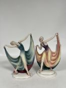 Katzhutte, a pair of porcelain Art Deco figures of ladies, each holding the hem of her dress