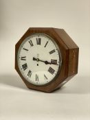 A double sided GPO fusee wall clock, mid 20th century, the mahogany case of octagonal outline having