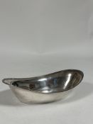 A George V silver bread basket, R. & W. Sorley, Glasgow 1931, oval, with reeded rim. Length 31cm, c.