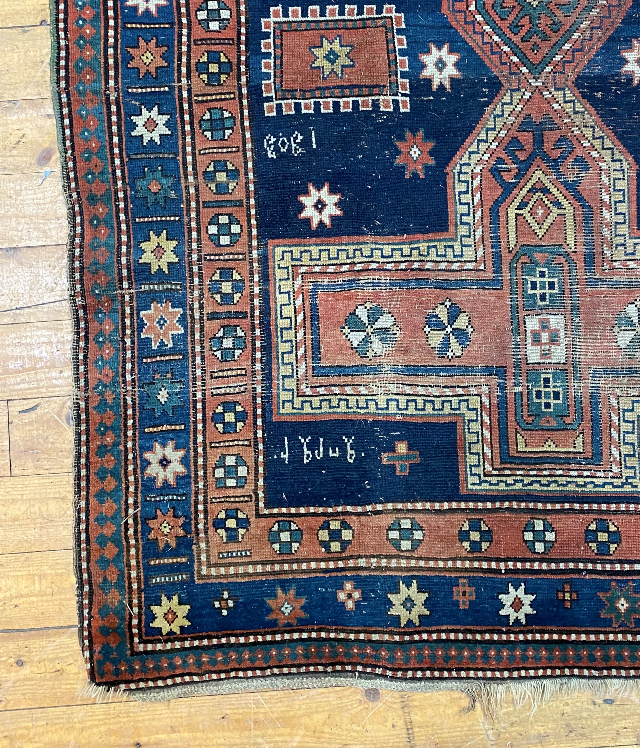 A hand knotted Caucasian Kazak rug, early 20th century, the blue field decorated with three - Image 3 of 3