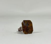 A 19th century agate desk seal, engraved with a bell and a monogram, of faceted tapering form,