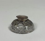 A George V silver-mounted cut-glass inkwell of capstan type, Samuel Jacob, London 1911, the domed