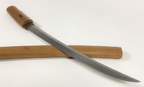 A Japanese Wakizashi sword in a shirasaya scabbard, late 19th/20th century, with a 37cm steel blade,