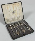 A cased set of six Georg Jensen silver grapefruit spoons, c. 1930, Acron pattern, maker's mark