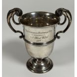 Military interest: a George V twin-handled silver trophy cup, Walker & Hall, Sheffield, 1914, with