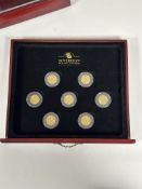 A cased set of seven George V full sovereigns: 1912, 1914 (2), 1918 (2), 1925 and 1930, each in a