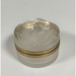 Lalique: a "Daphne" glass powder box, with moulded hinged cover and gilt-metal mounts, etched