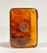 A 9ct gold mounted tortoiseshell lady's cigarette case, Horton & Allday, Birmingham 1925, oblong,