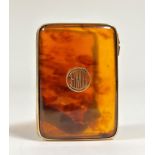 A 9ct gold mounted tortoiseshell lady's cigarette case, Horton & Allday, Birmingham 1925, oblong,