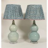 A pair of large OKA "Hulu" double gourd pottery table lamps, in a celadon crackle glaze, with blue