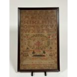 A late 18th century needlework sampler, Janet Watt, aged 14, worked with a fountain, birds, animals,