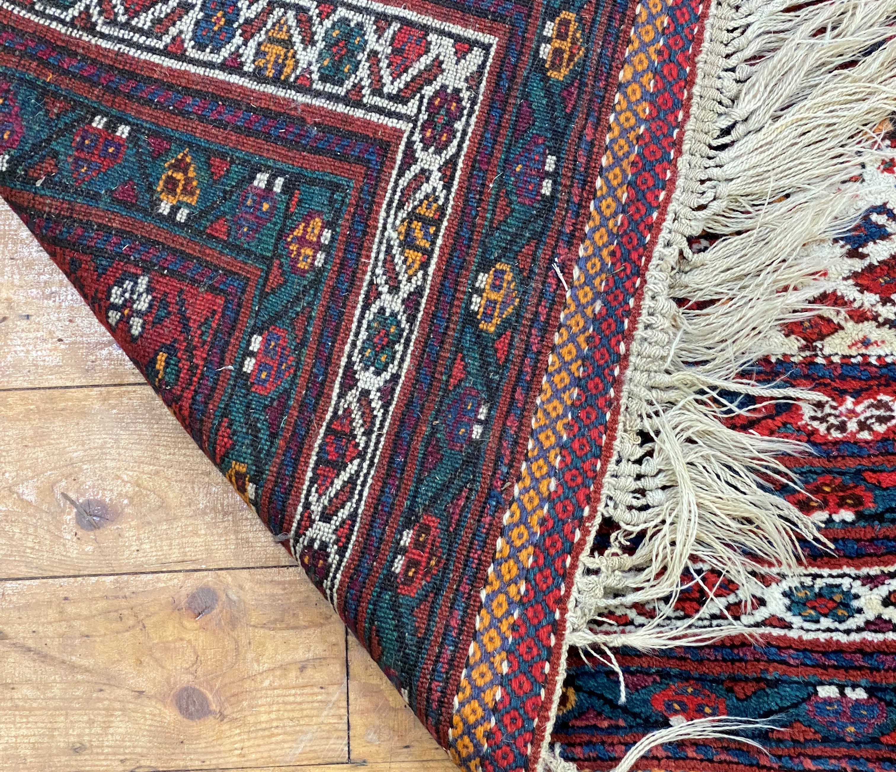 A hand knotted Caucasian rug, of all over geometric design with multiple guard stripes to border - Image 3 of 3
