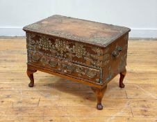 A 19th century Zanzibar hardwood casket, the case embellished with floral engraved and pierced