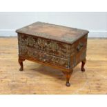 A 19th century Zanzibar hardwood casket, the case embellished with floral engraved and pierced