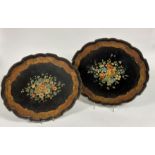 A near pair of Italian painted and gilt wooden trays, mid-20th century, oval with scalloped rims,