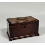 A George III mahogany tea caddy, of two divisions, of plain oblong form with bracket feet. 14cm by