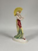 Katzhutte, a large Art Deco porcelain figure of a girl holding a fan aloft, green printed marks.