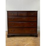 A Scottish George III mahogany chest of drawers, the top with moulded edge over three short and