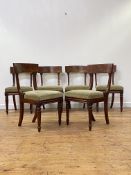 A set of six William IV mahogany dining chairs, the well figured and curved tablet crest rail over