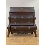 A stained oak Dutch bombe bureau, late 18th century, the fall front opening to an interior fitted