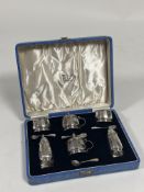 A cased George VI silver condiment set, Davidson, Henderson & Sorley, Birmingham 1939, each piece of