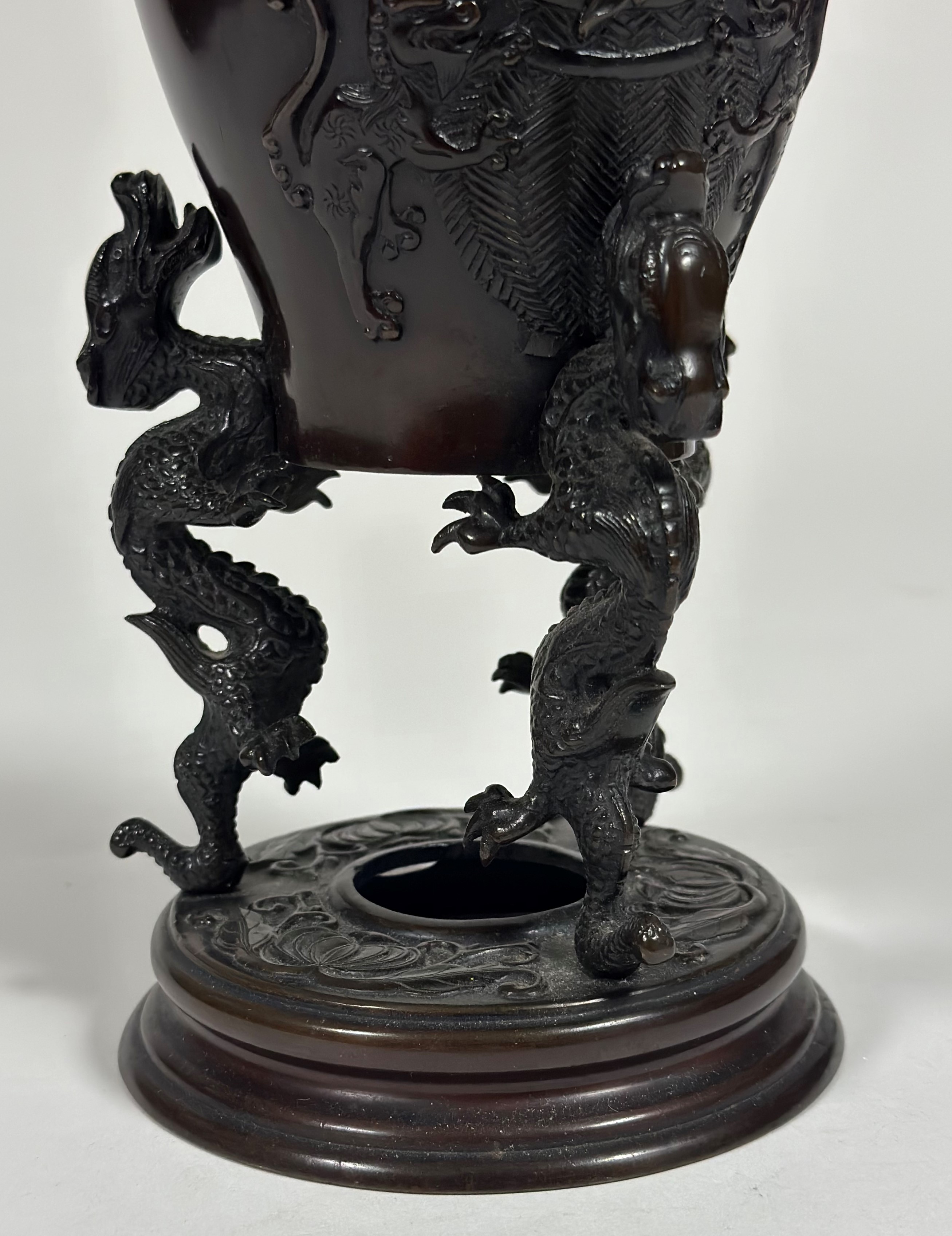 A Japanese bronze tripod censer, Meiji period, of baluster form, the body in relief with baskets - Image 3 of 7